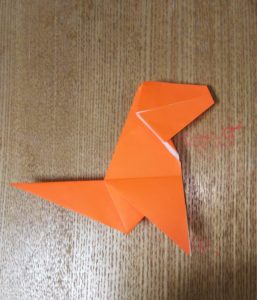 オレンジの折り紙で作ったティラノサウルス